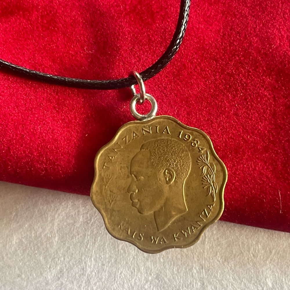 Singular unique Tazmamia coin pendant necklace